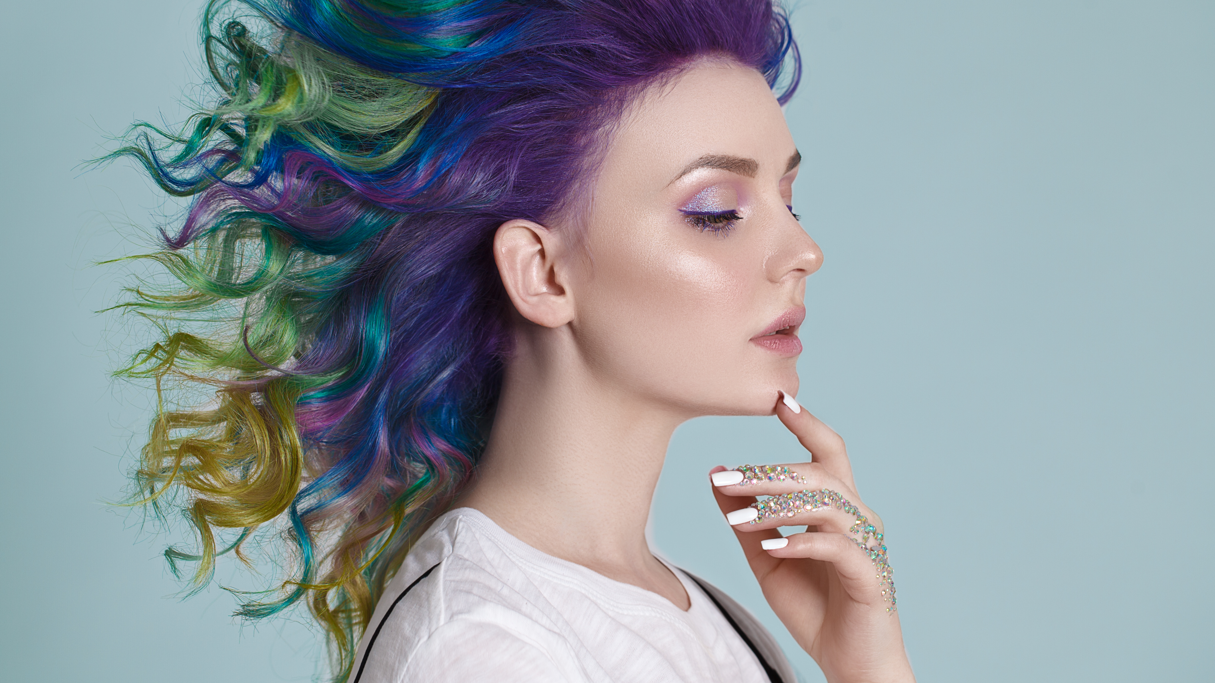 Colored hairs. Portrait of beautiful women with flying hairs and ...