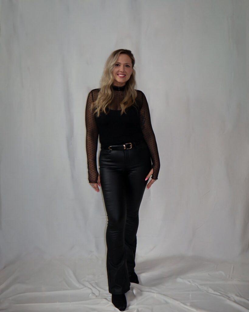 Teryn hair stylist on the Dellaria Salons team in Massachusetts full length studio portrait